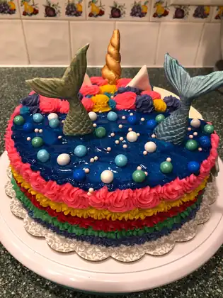 Mermaid and unicorn themed birthday cake