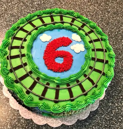 6th birthday cake with train tracks
