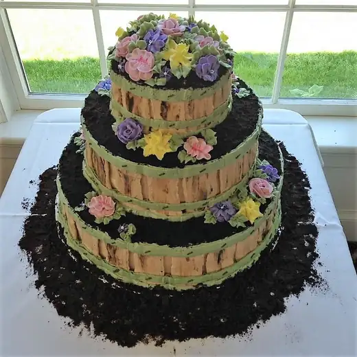 Wedding cake with flowers and a Cape Cod theme