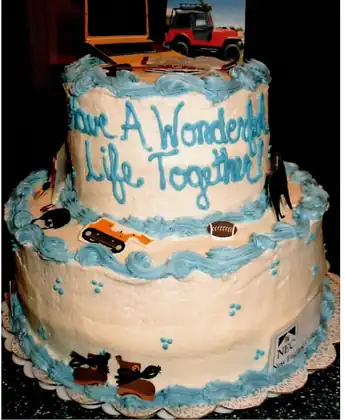 Groom's cake with jeep, football and hiking theme