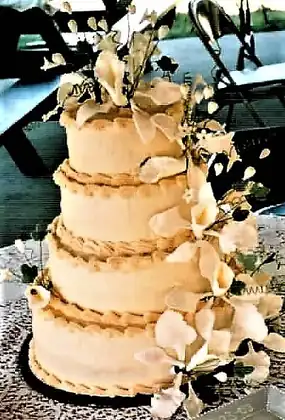 Wedding cake with cascading handmade flowers