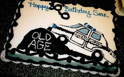 Over the hill sheet cake with police car