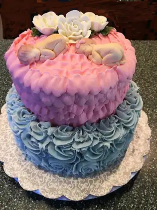 Baby celebration cake in pink and blue
