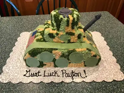 Good luck cake shaped like an army tank