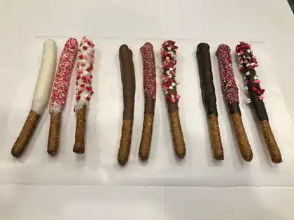 Decorated chocolate pretzel rods